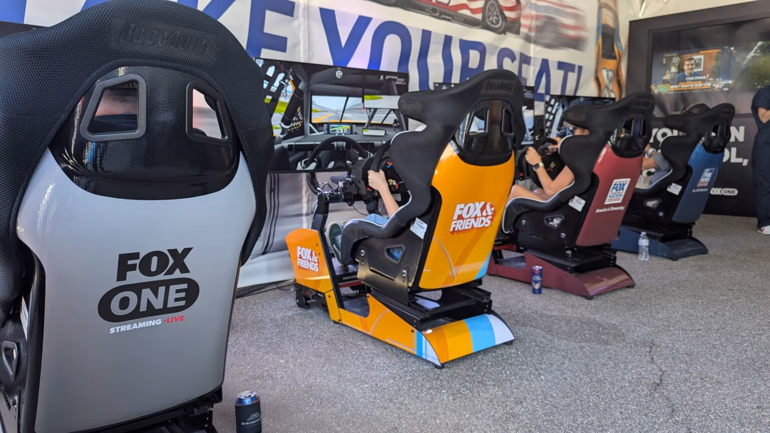 Simulators at the Fox News Racing-Themed Trade Show Booth at the Daytona 500